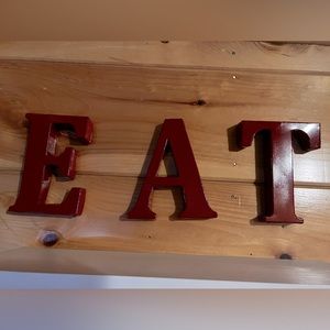 3/$15: Barn red metal “EAT” letters